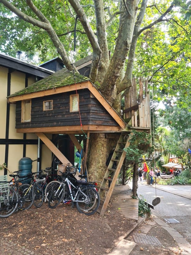 Timber framed self-build home at Chinbrook meadows customised with tree house extension.